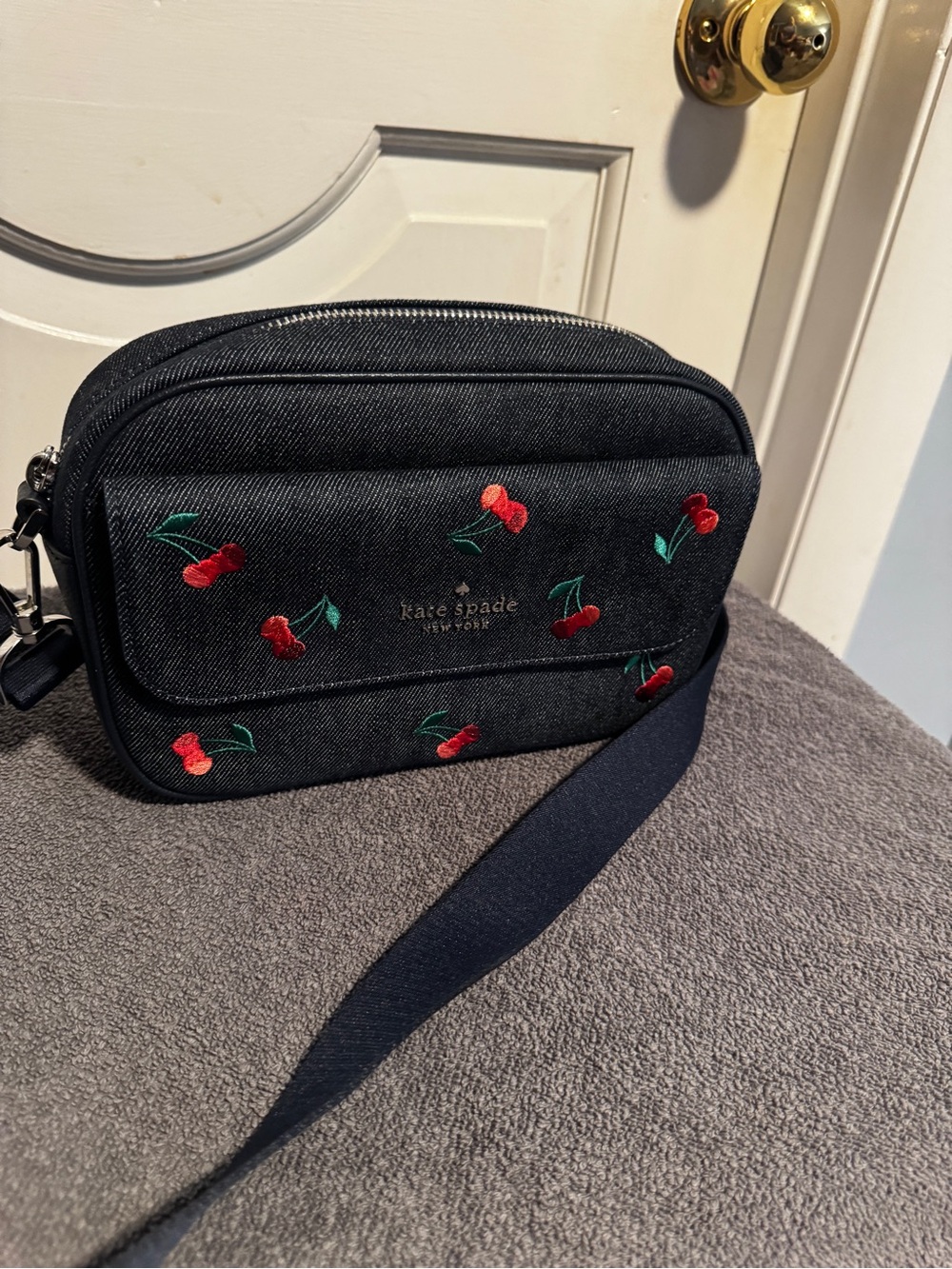 kate spade black denim crossbody with red cherry embroidery